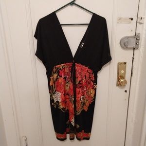 Black and floral low neck and back dress